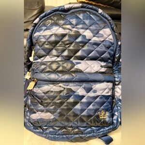 Oliver Thomas Mini Back pack in camouflage blue color.